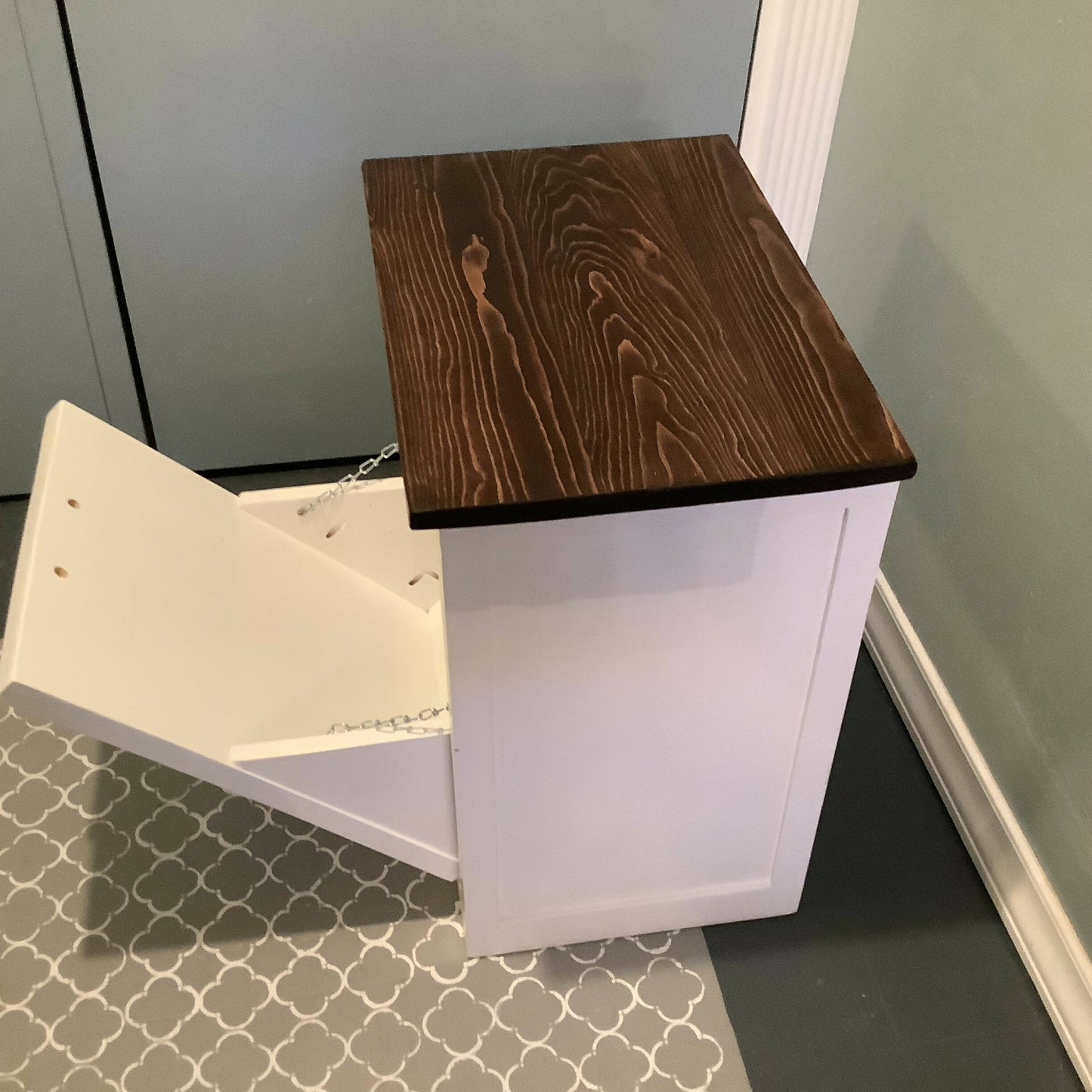 Tilt-out cabinet