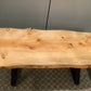 Live edge coffee table with cris cross legs