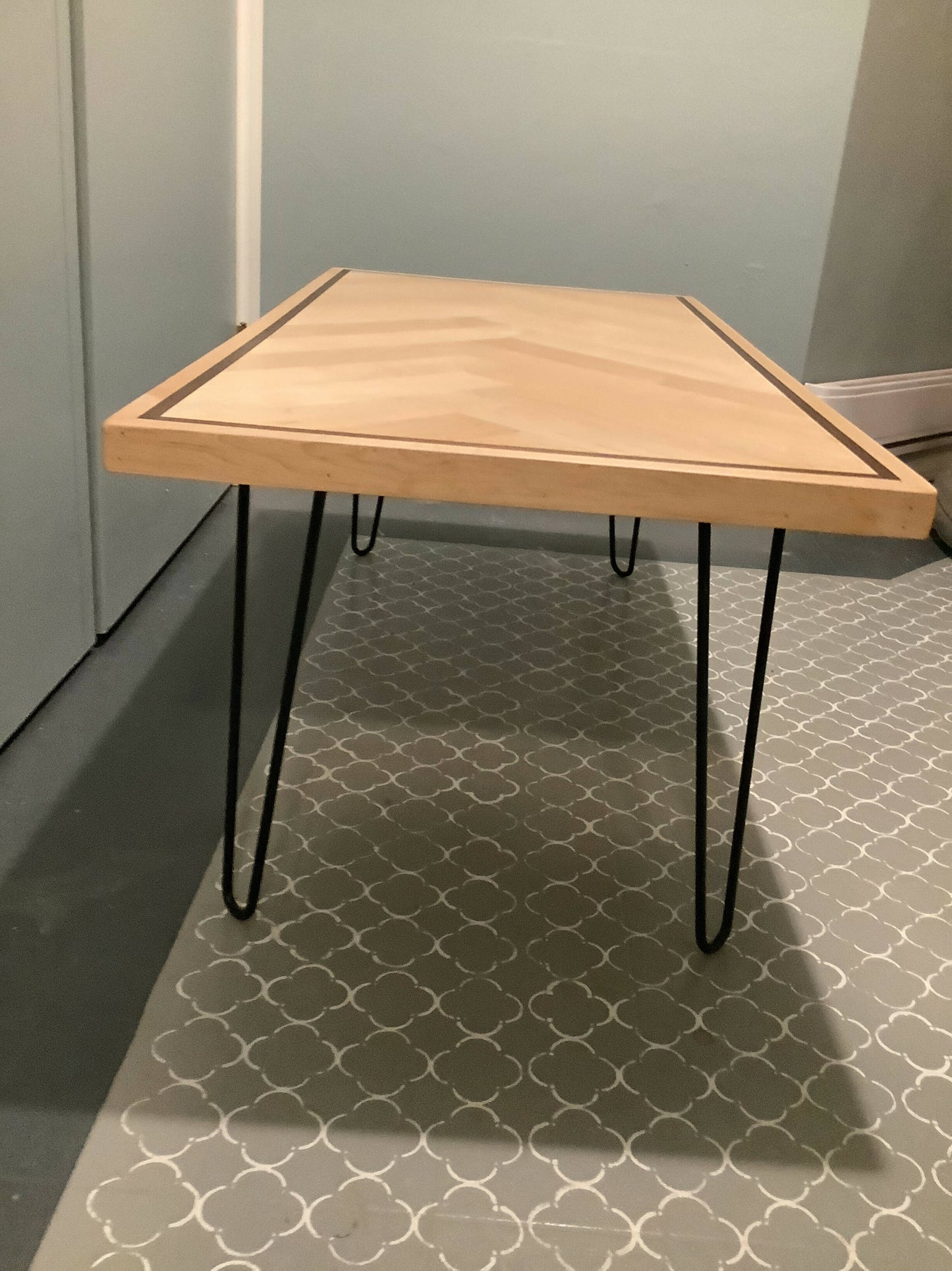 Maple coffee table with walnut inlay